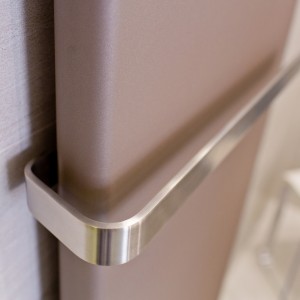 Detail vzorkové koupelny v koupelnovém studiu Gremis - koupelnový radiátor